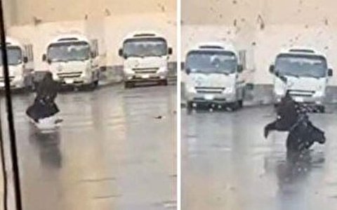 خوشحالی غیرمتعارف دختر محجبه عربستانی پس از بارش باران